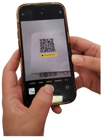 Smartphone scanning 33 ALERTS Smart QR Decal for emergency help